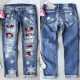 2025 European and American cross-border straight jeans for women, Christmas snowflake print patchwork ripped denim pants in stock 2025 European and American cross-border straight jeans for women, Christmas snowflake print patchwork ripped denim pants in stock
