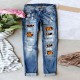 European and American cross-border AliExpress trendy Halloween pumpkin ripped print jeans for women, mid-rise straight-leg pants European and American cross-border AliExpress trendy Halloween pumpkin ripped print jeans for women, mid-rise straight-leg pants